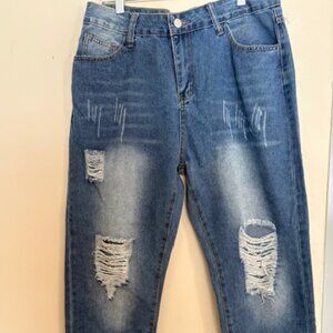 Never worn womans distressed/ripped lightweight jeans
